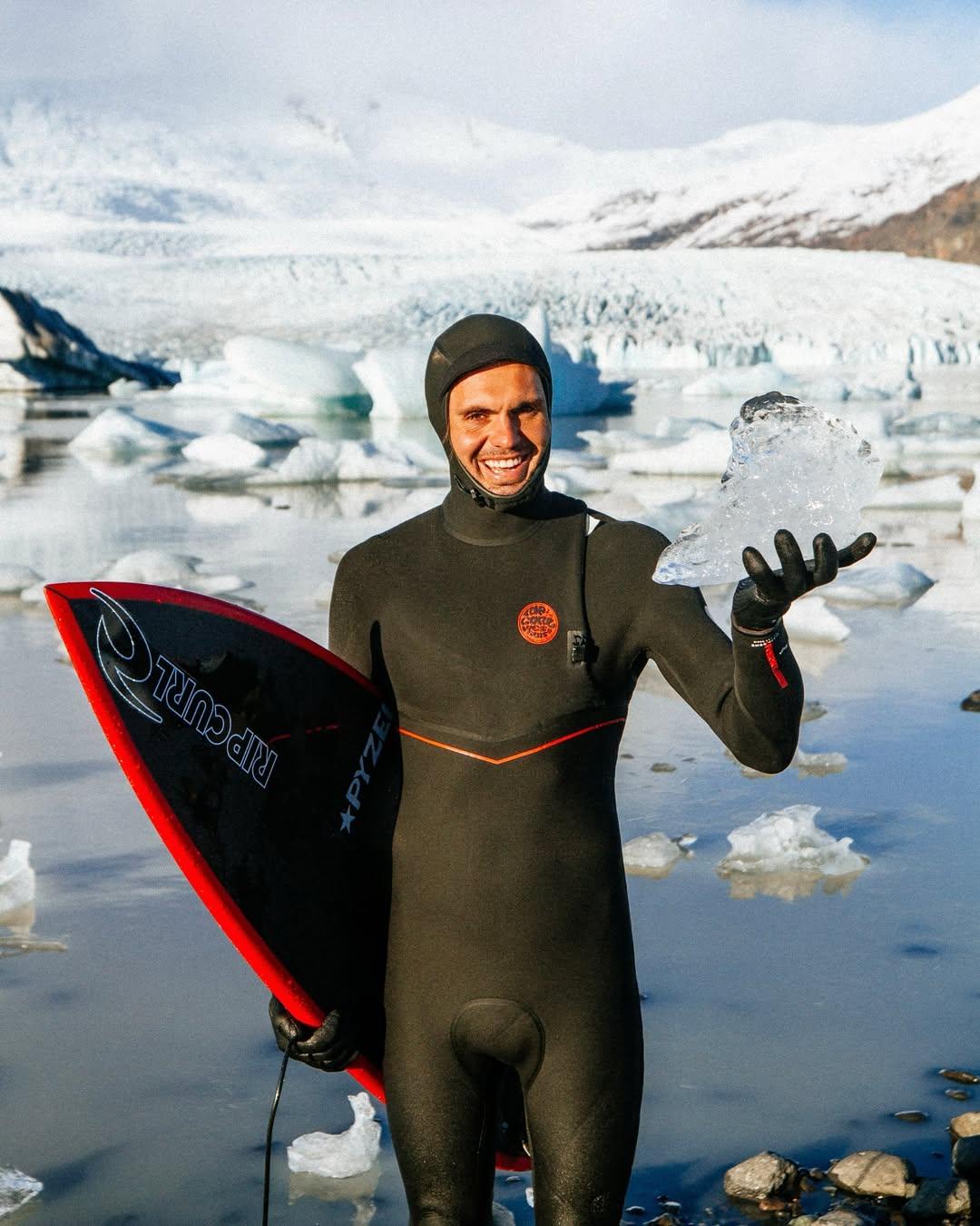 Person holding surfboard